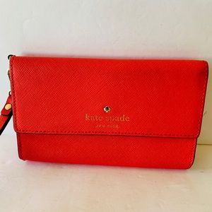 NEW Kate Spade Trifold Wallet New with dust bag red color Sizes New L6”. H4”
